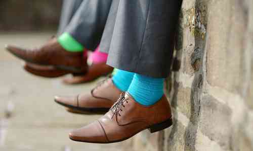 Men wearing colored socks