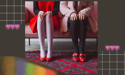 Two ladies wearing stockings as a part of their outfit